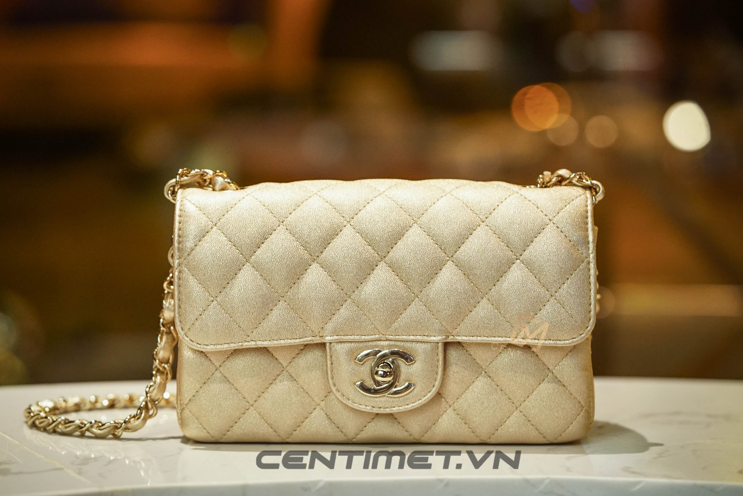 Túi Xách Chanel Mini Flap Bag Metallic Lambskin Gold Metal Gold -  